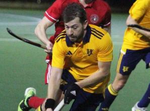 Taylor and Joyce on target as table toppers win derby clash