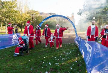 Santas raise thousands for Alexander Devine through annual dash in Windsor