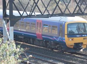 Rail service cuts plan criticised by Theresa May MP
