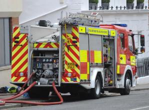 Firefighters from three counties still 'checking for hotspots' after Burnham roof fire