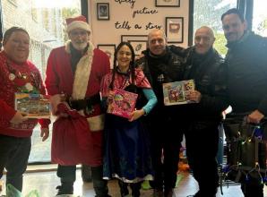 Motorcyclists deliver Christmas presents to sick children