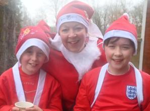 Storming Santas defy strong winds for running fundraiser
