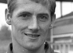 Woman knitting for charity in memory of footballer