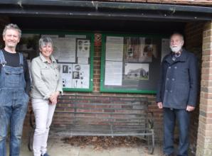 Noticeboards installed in bus shelter detailing history of village