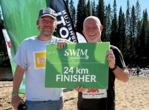 Pair complete Arctic river swim