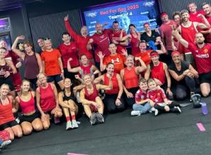 Gym members wear red for boy with muscle wasting disease