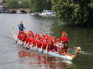 Mothers row 20 miles in dragon boat for school