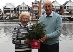 Woman steps down after 50 years with housing trust