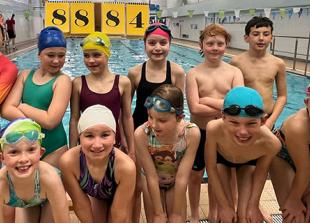 Swimmers squash own event record