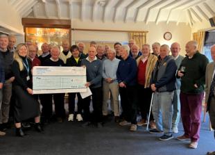 Golfers raise £5,800 for charity