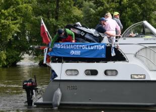 POOR RIVER QUALITY SINKS PROTEST SWIM