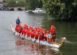 Mothers row 20 miles in dragon boat for school