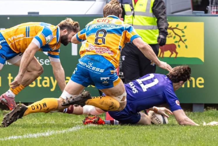 Rhoades’ maiden treble not enough as Plymouth prevail