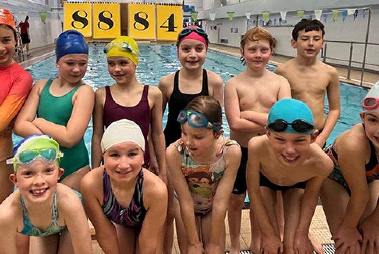 Swimmers squash own event record  
