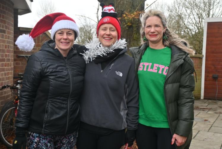 Storming Santas defy strong winds for running fundraiser