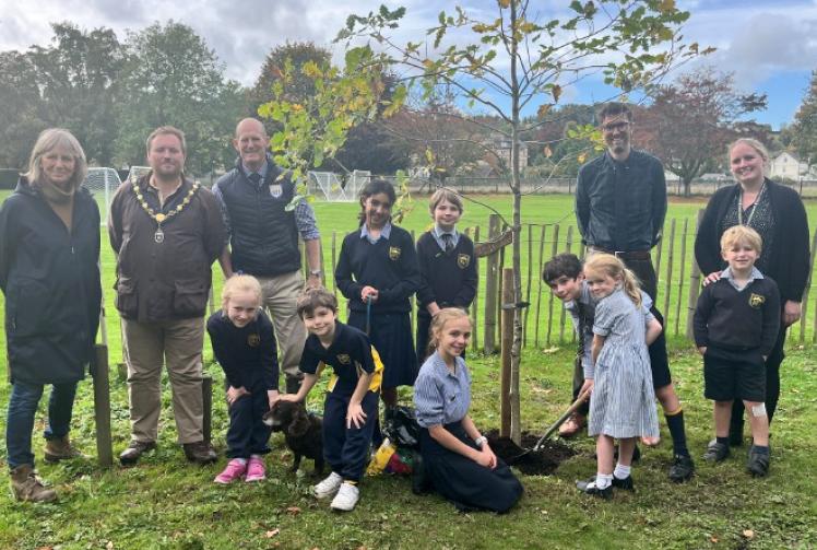 School plants two trees for 100th birthday
