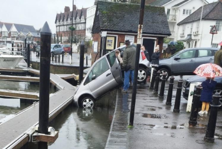 Elderly woman rescued after accidentally driving into river