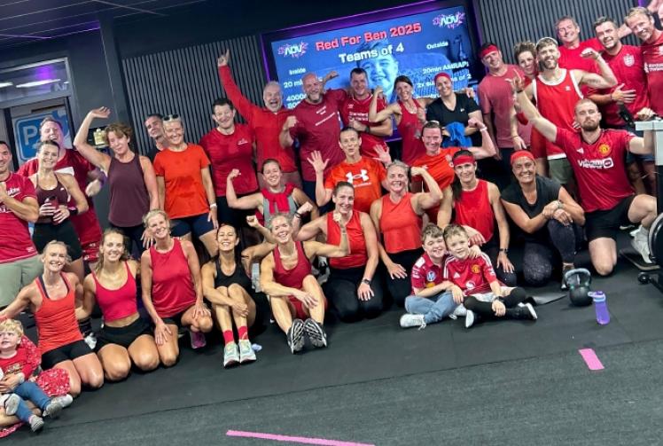 Gym members wear red for boy with muscle wasting disease