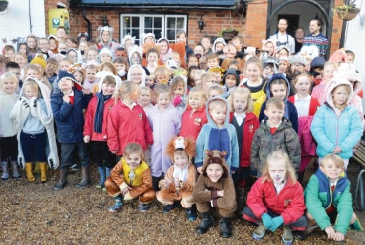 Children’s fancy dress walk raises £1,000 for animals